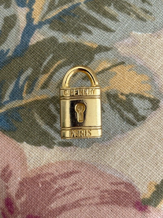 Pozłacana miniaturowa broszka Givenchy