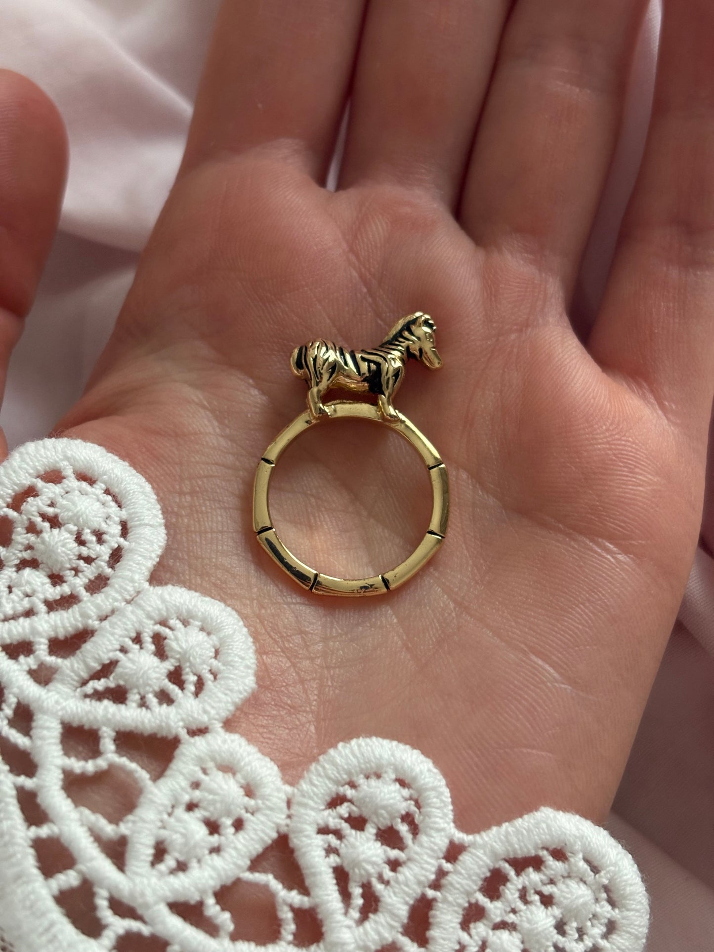 Ring with a zebra figurine