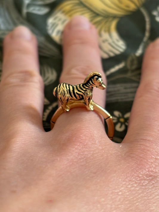 Ring with a zebra figurine
