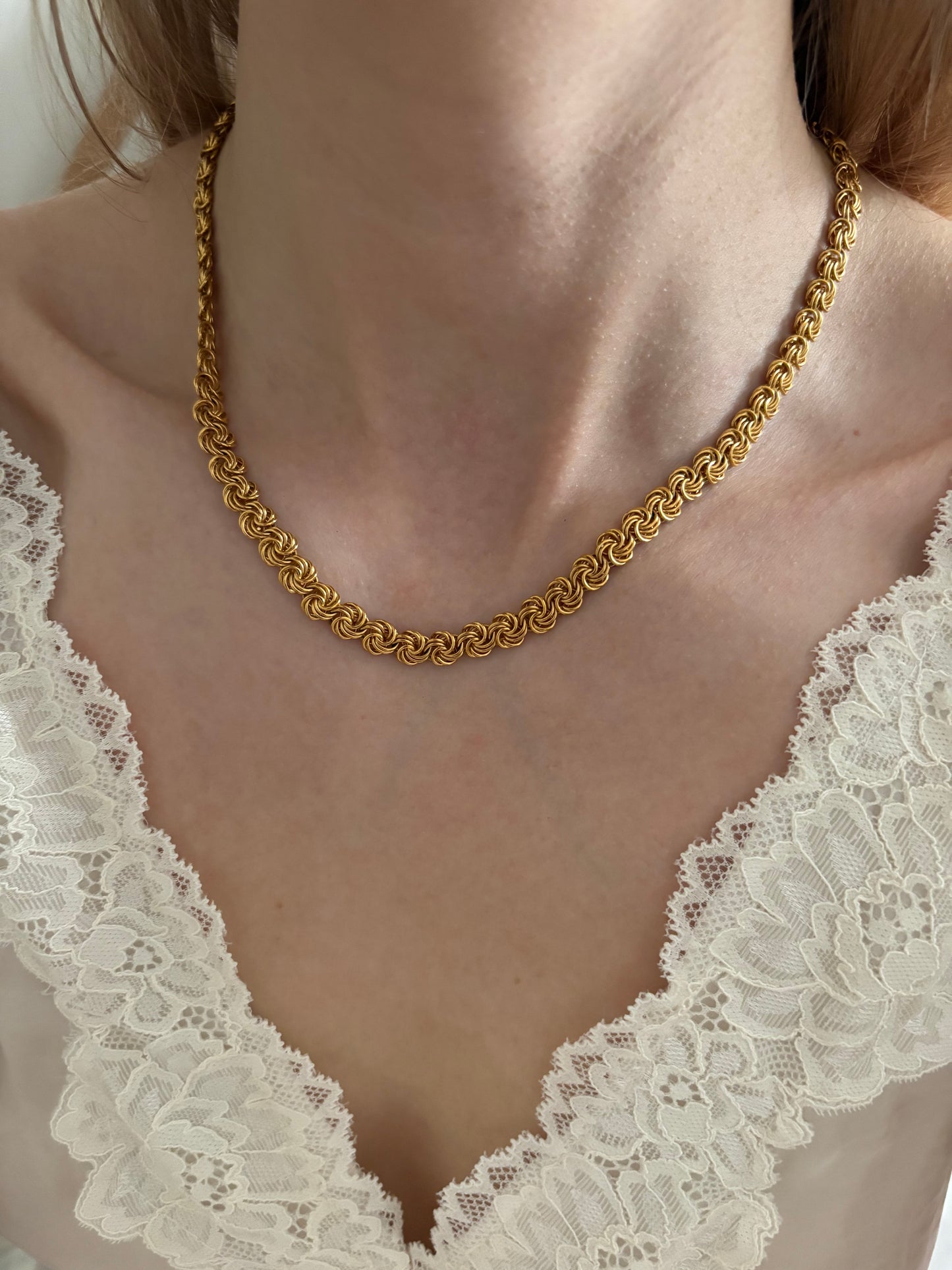 Trifari necklace with knot links