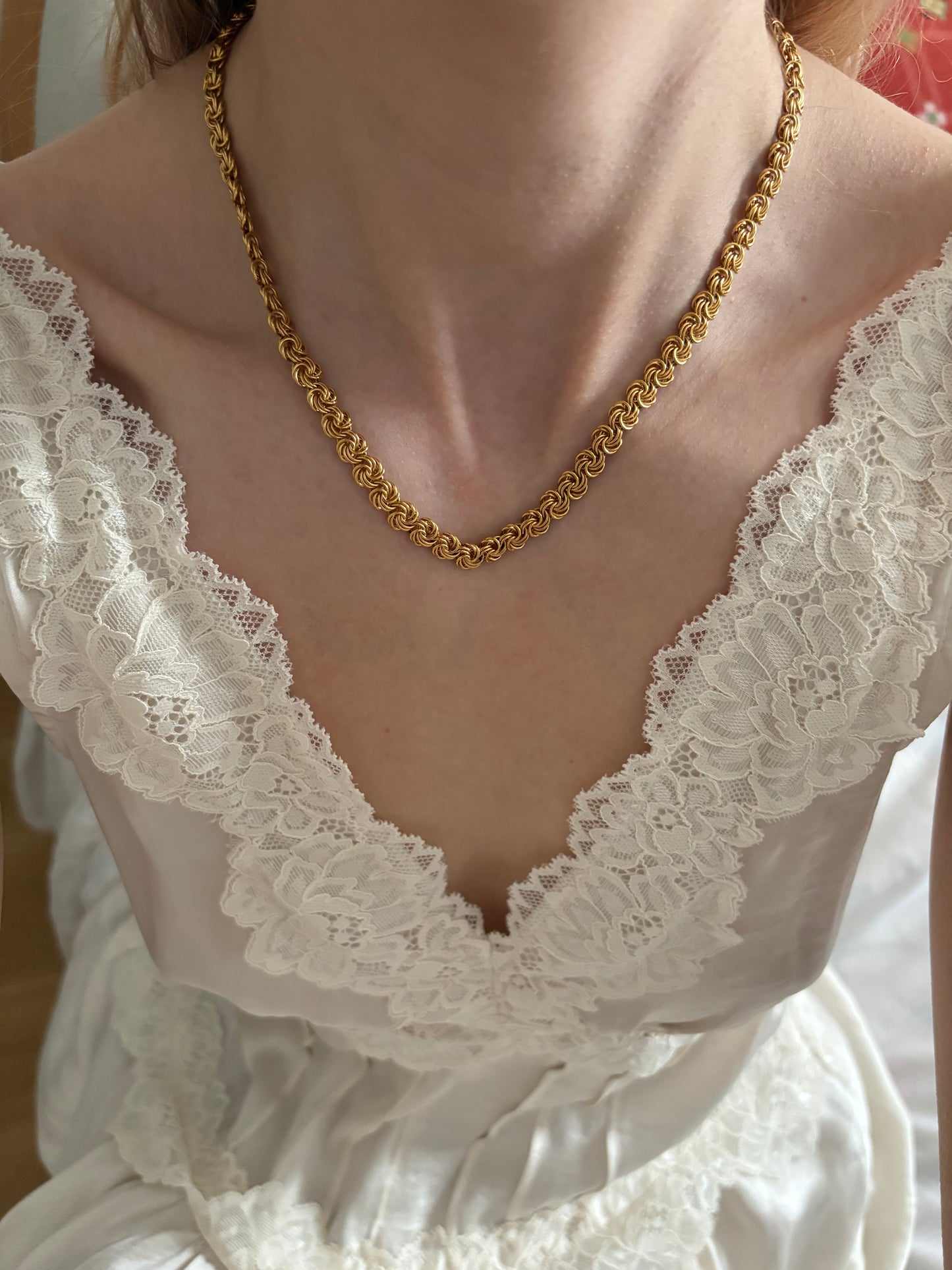 Trifari necklace with knot links