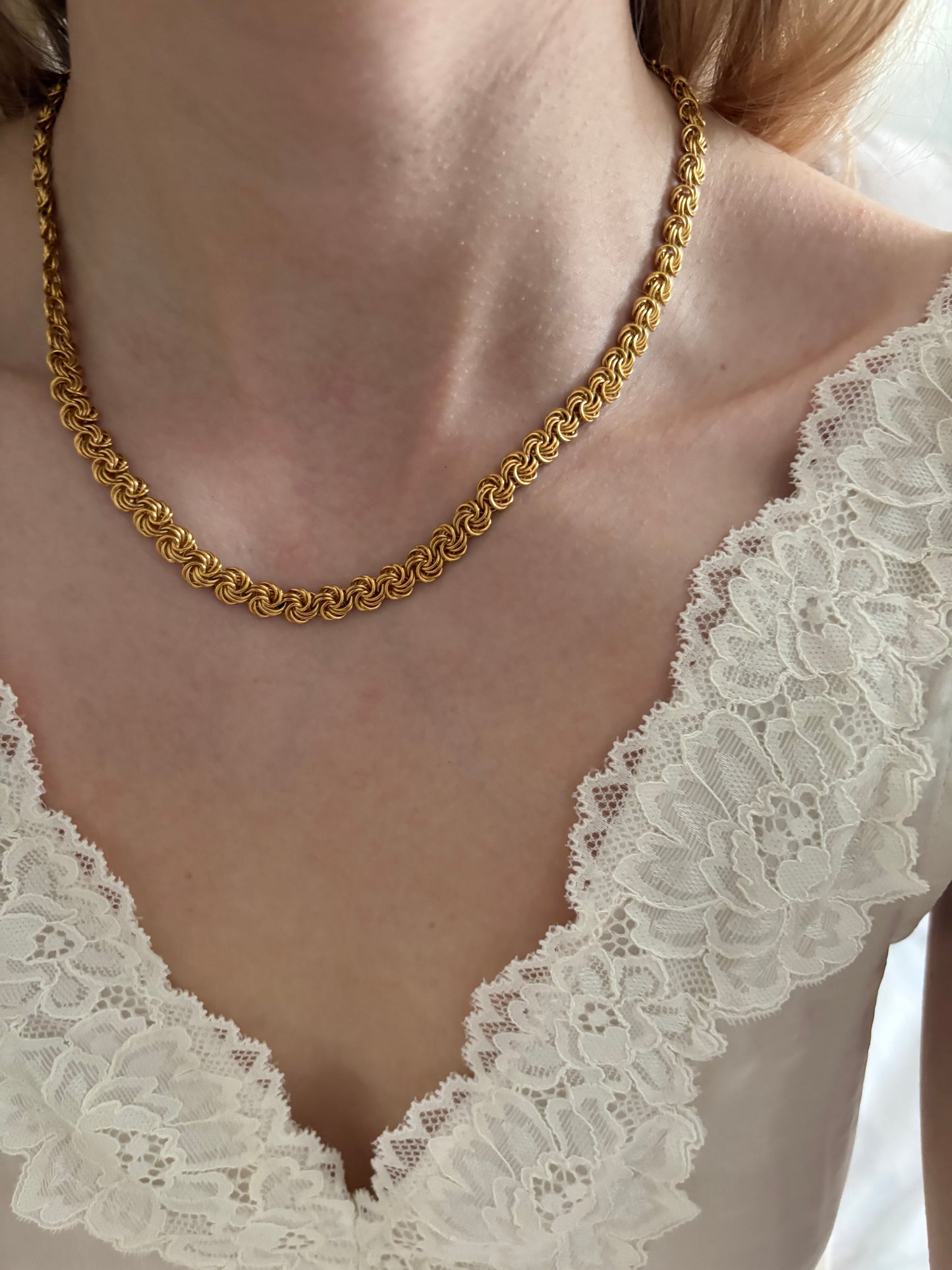 Trifari necklace with knot links