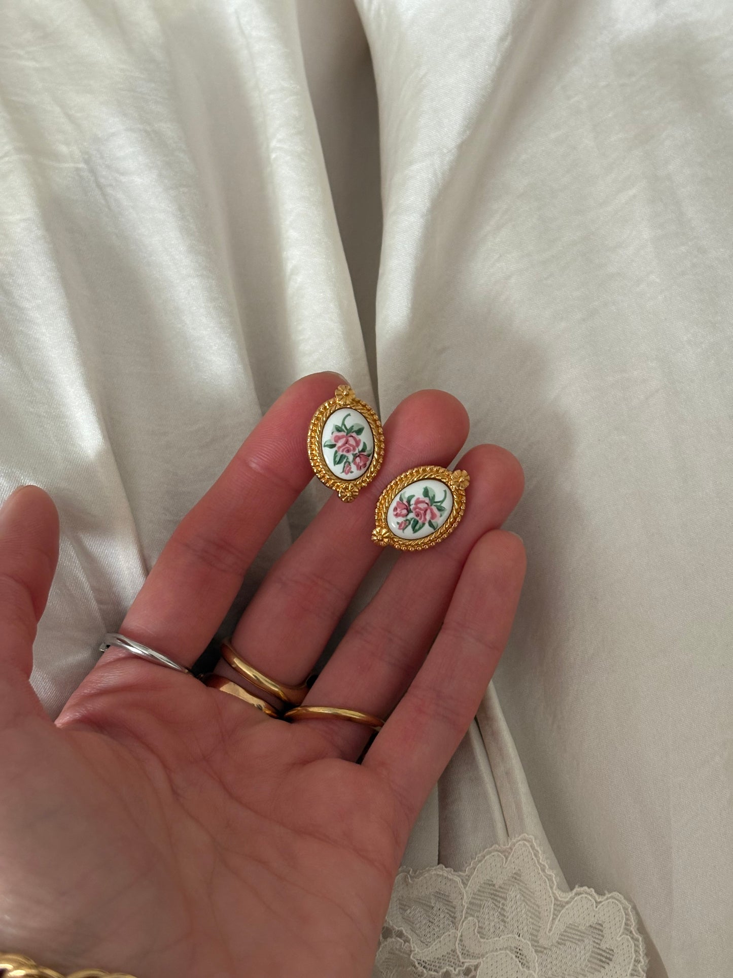 Avon earrings with painted decoration