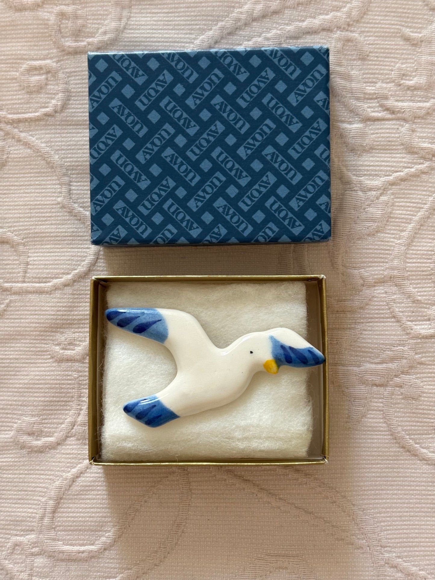 Avon "Take Flight" ceramic brooch, 1980
