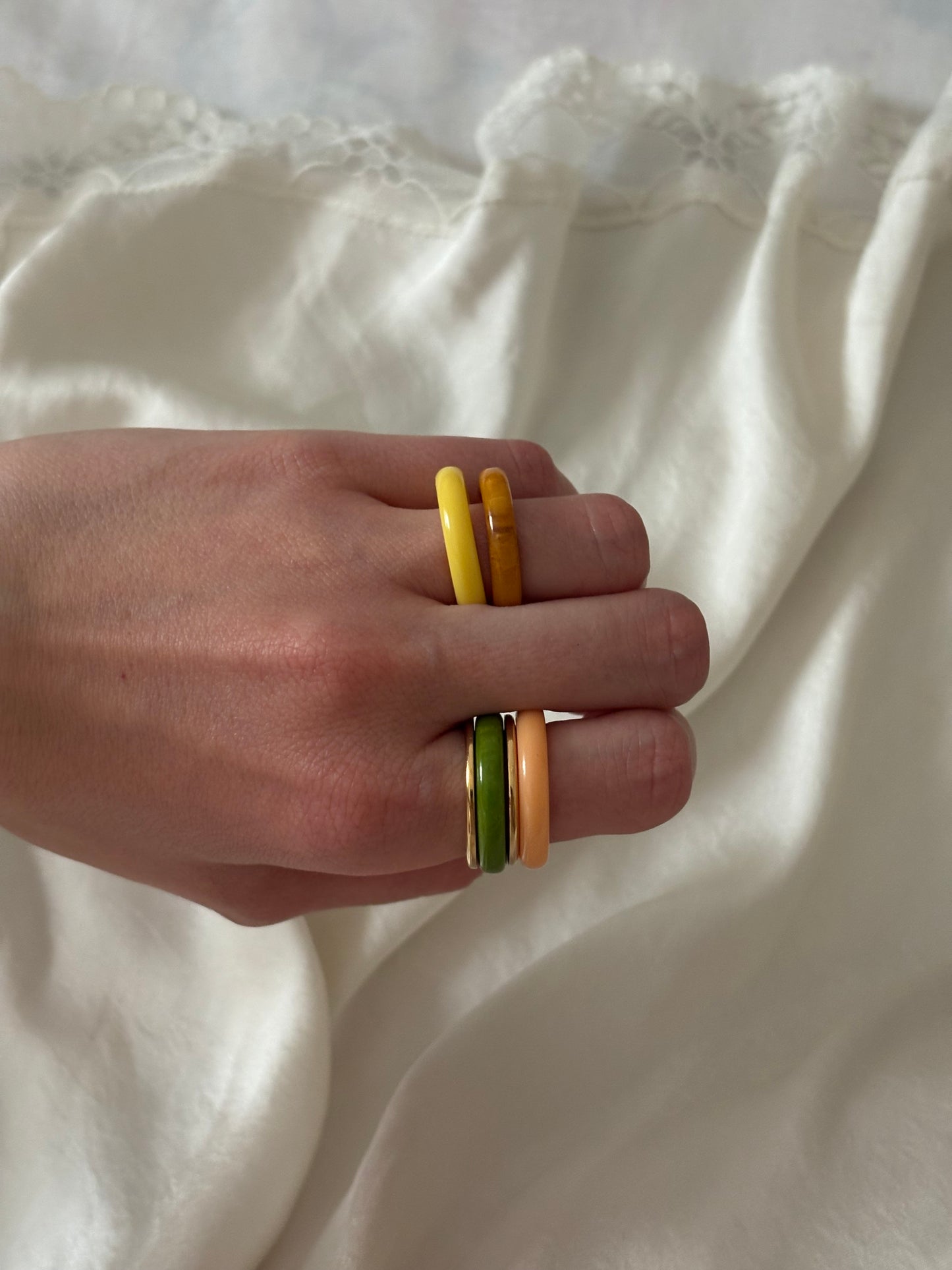 Set of 4 interchangeable Avon rings, 1977