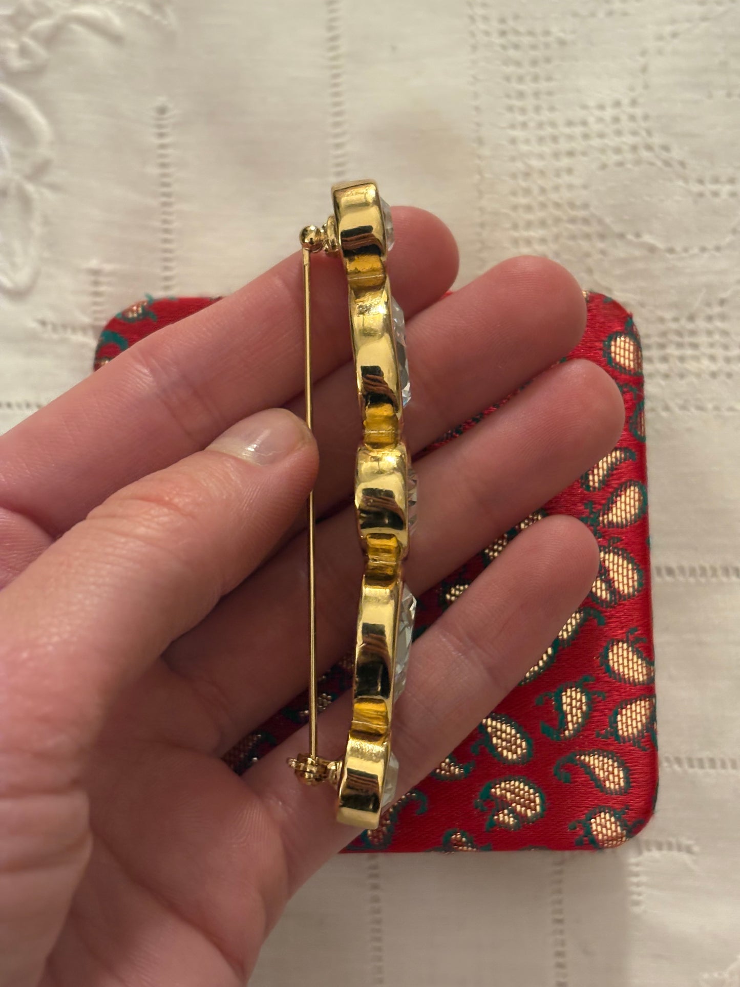 Pozłacana broszka Givenchy z kryształami