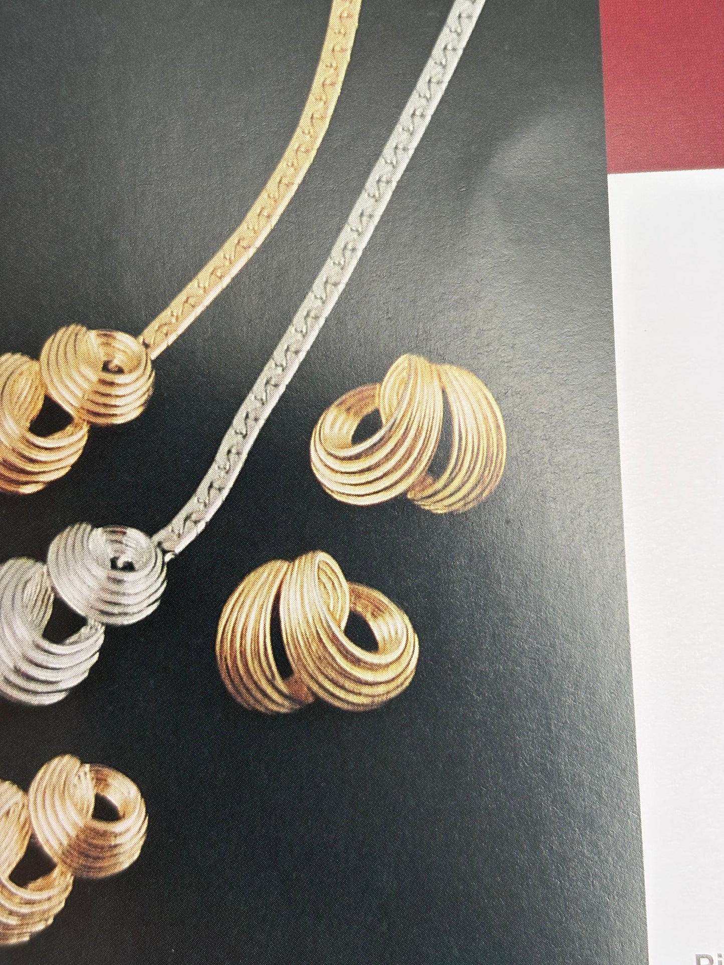 Pozłacane kolczyki „Ribbon Curl” Avon, 1989 rok