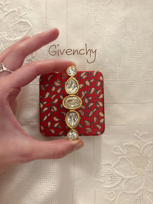 Pozłacana broszka Givenchy z kryształami