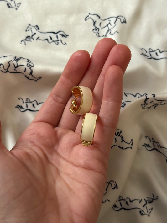 Monet clip-on earrings with white enamel
