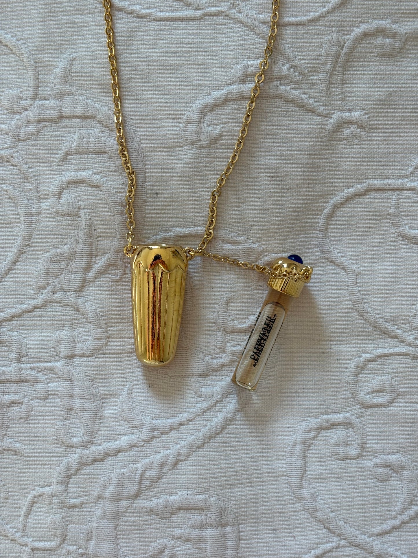 Naszyjnik/ Flakonik  z perfumami Avon, 1990 rok