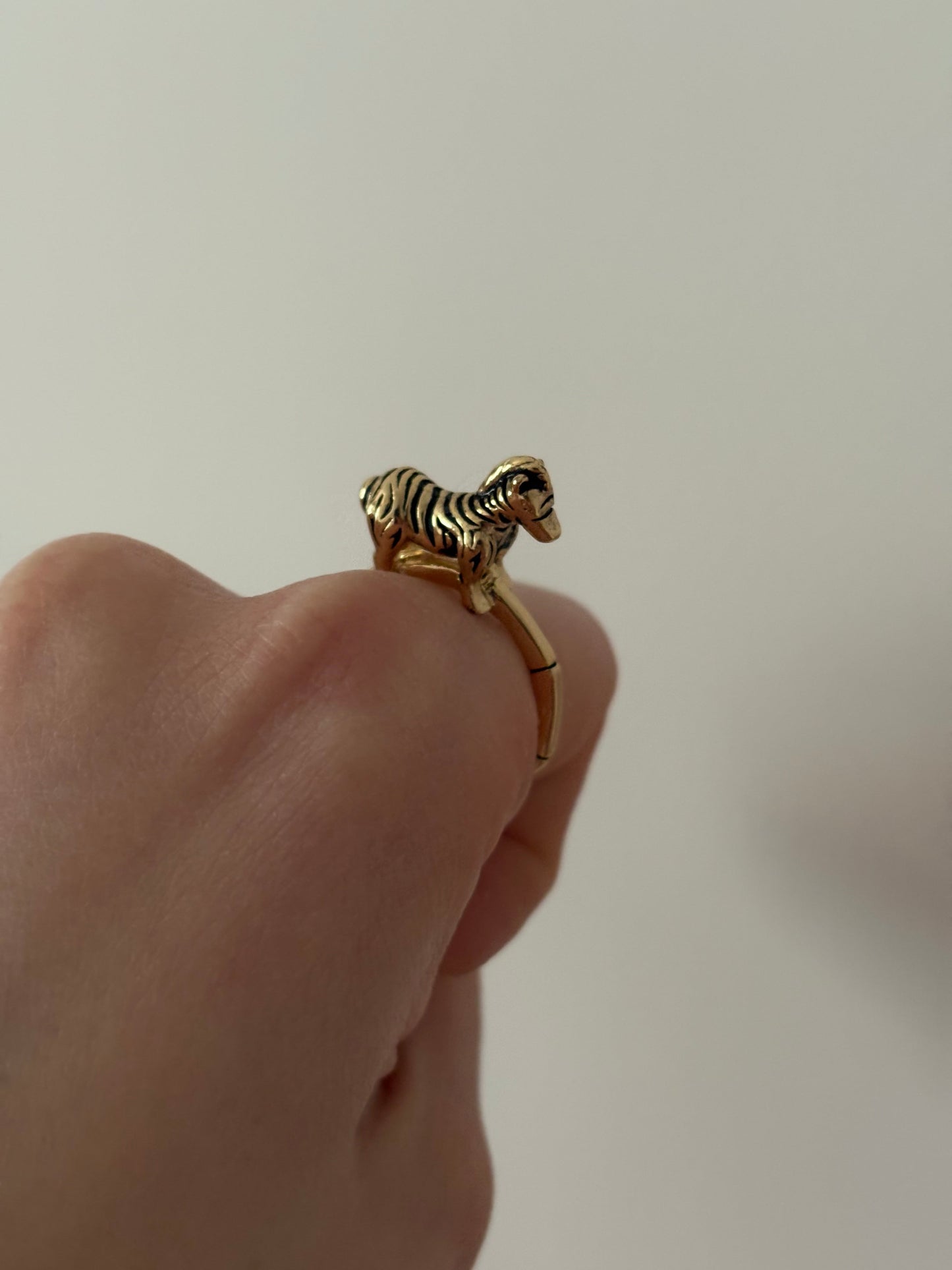 Ring with a zebra figurine