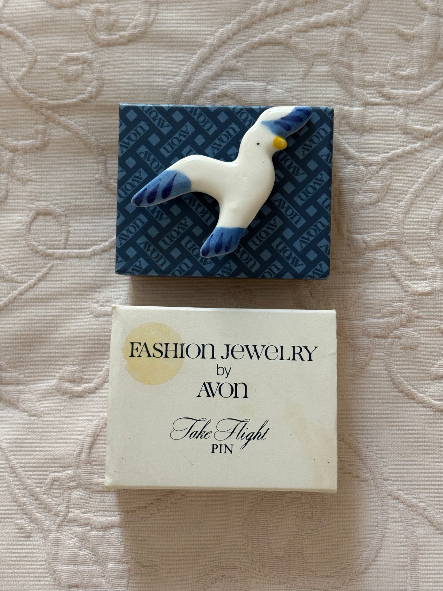 Avon "Take Flight" ceramic brooch, 1980
