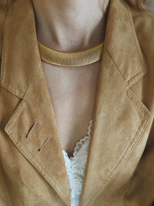 Złocony naszyjnik typu Omega