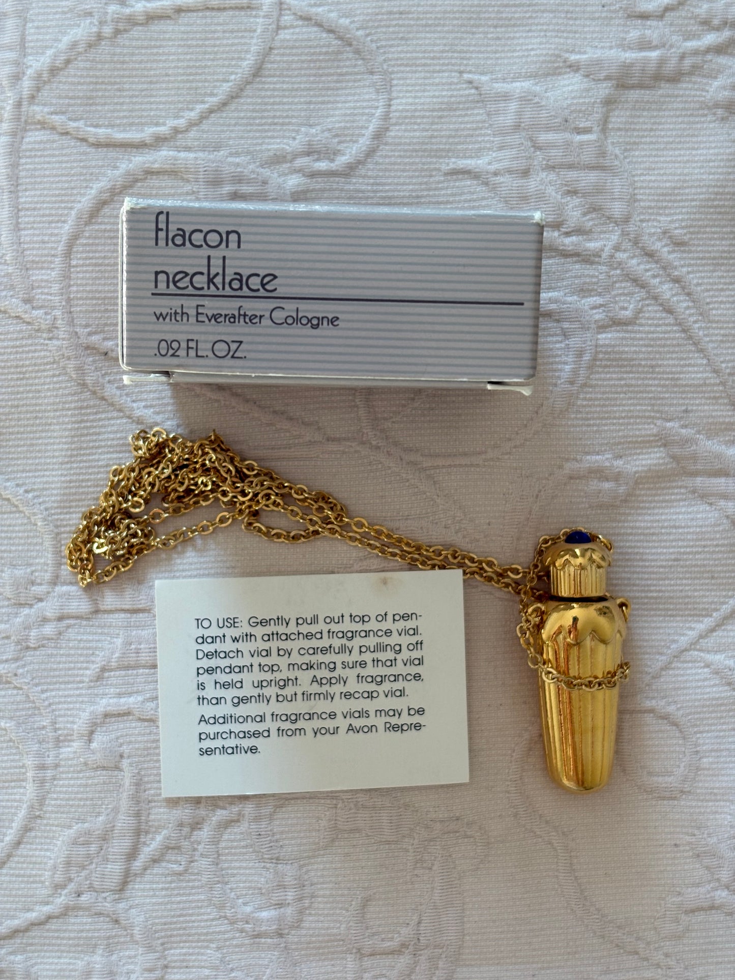 Naszyjnik/ Flakonik  z perfumami Avon, 1990 rok