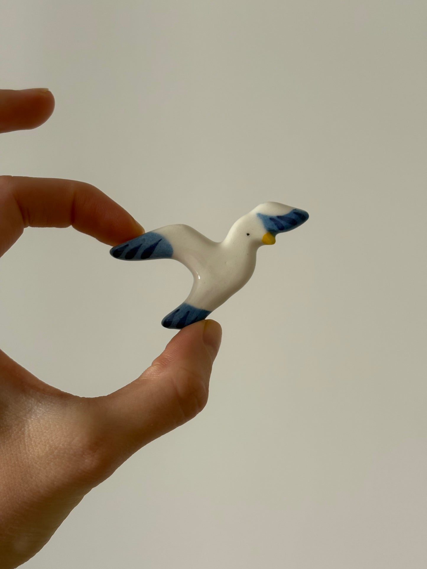 Avon "Take Flight" ceramic brooch, 1980
