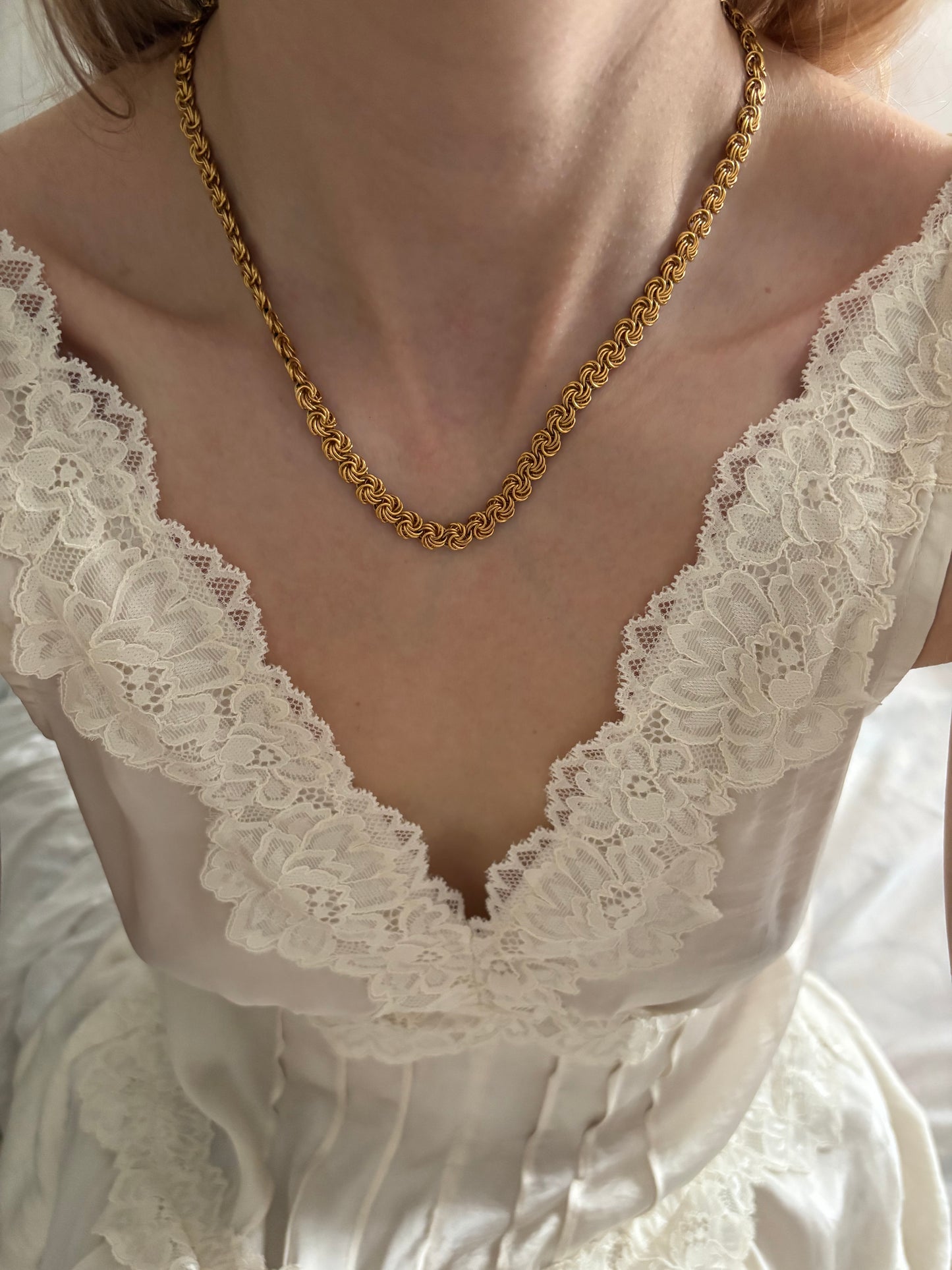 Trifari necklace with knot links