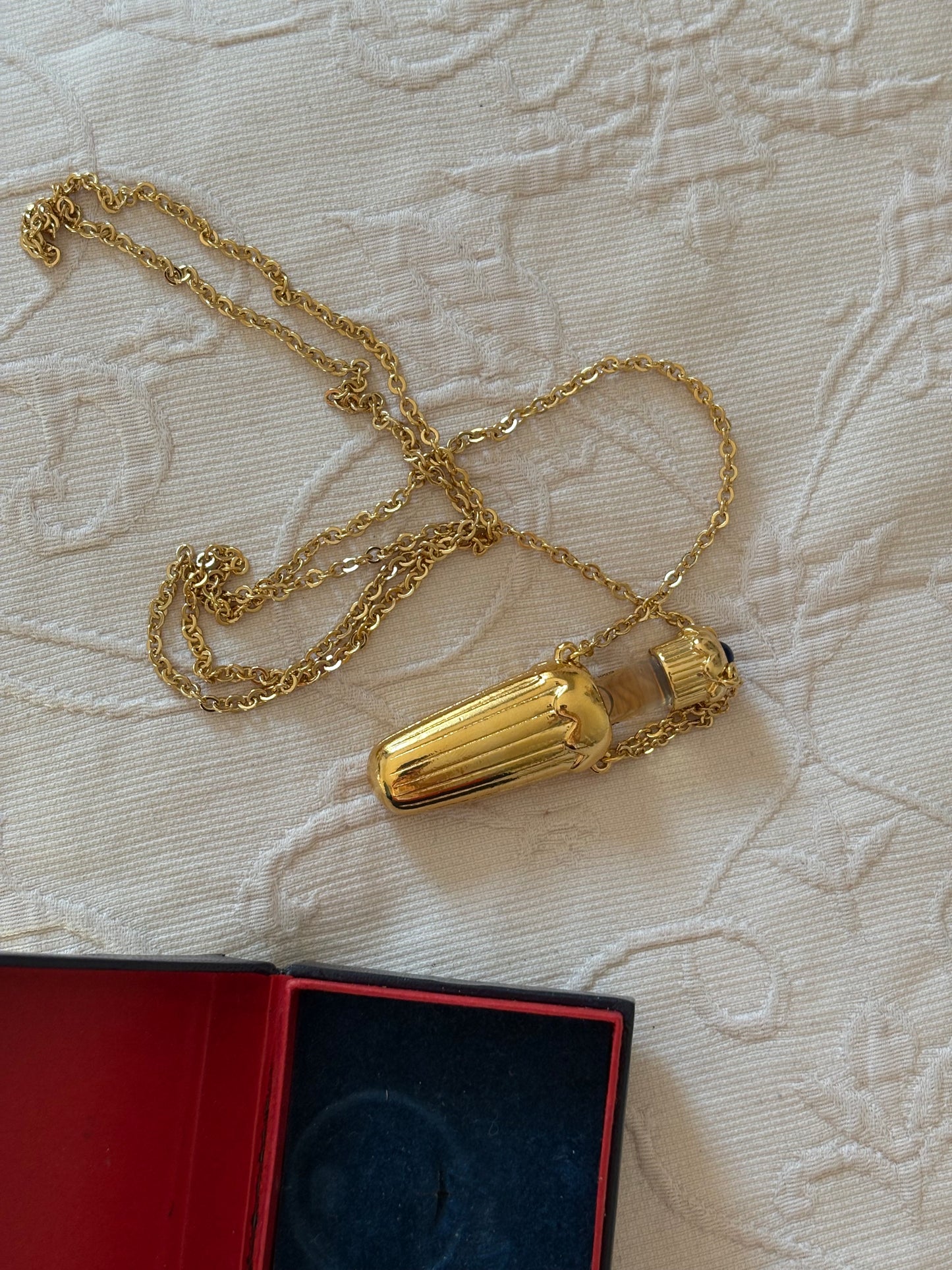 Naszyjnik/ Flakonik  z perfumami Avon, 1990 rok