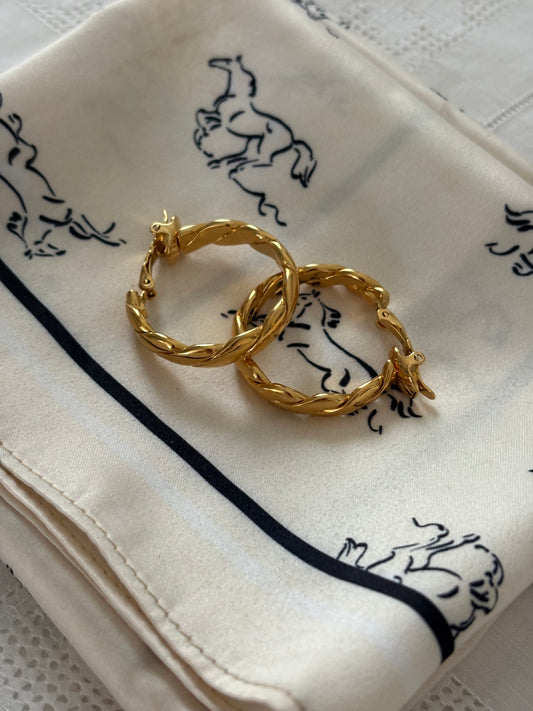 Klipsy-koła Trifari w plecionym stylu